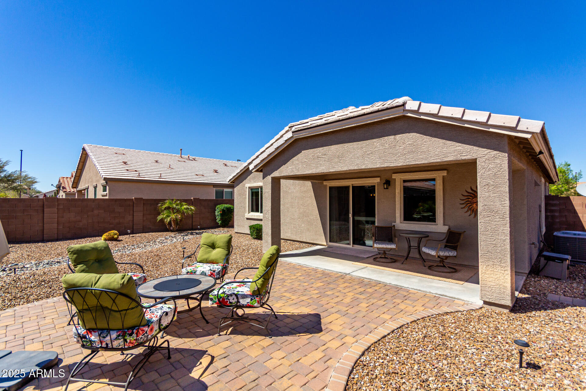 2169 East Gillcrest Road Gilbert, AZ 85298 - Photo 36 of 77 a view of a house with backyard sitting area and furniture
