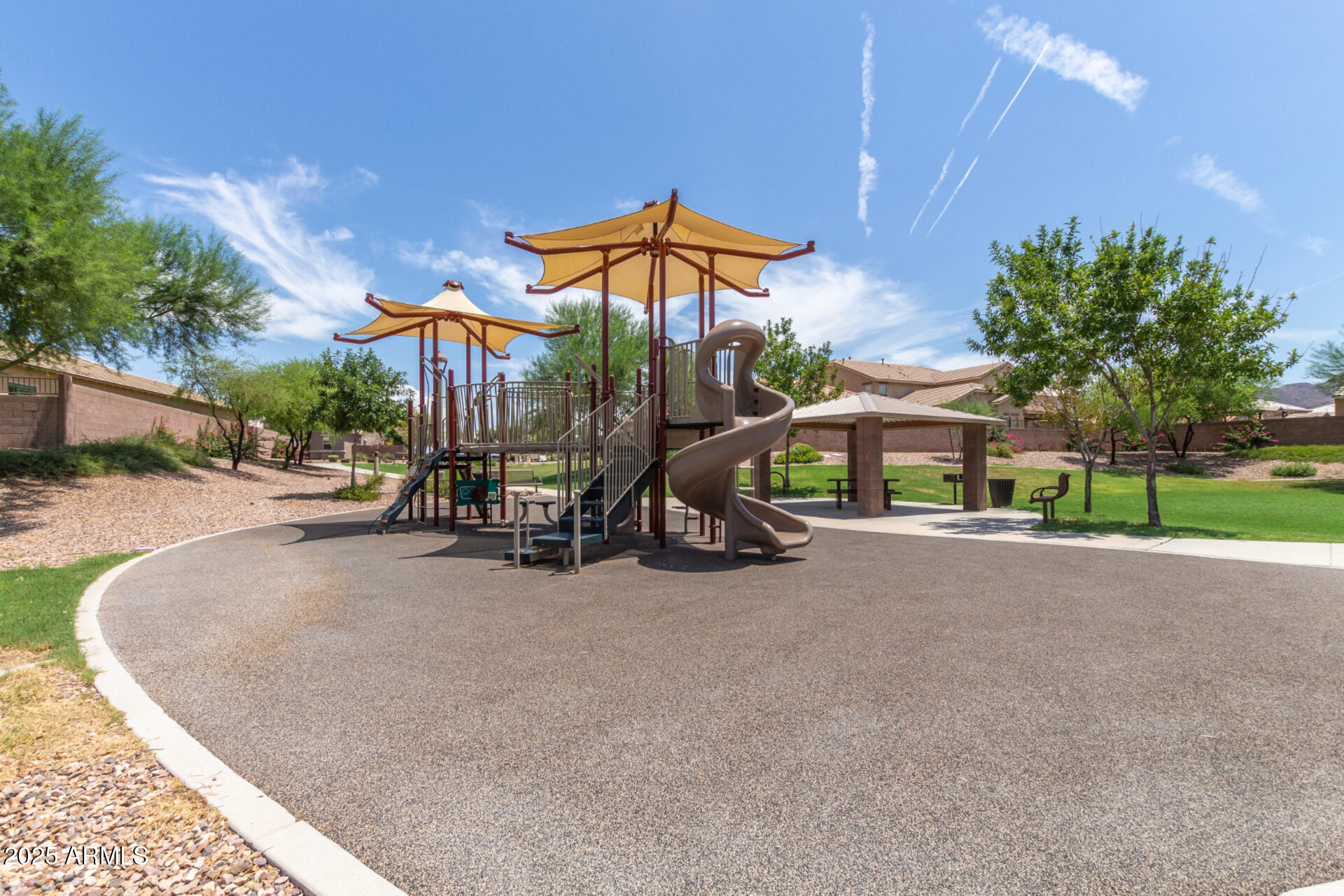 2169 East Gillcrest Road Gilbert, AZ 85298 - Photo 50 of 77 a view of a house with a yard and sitting area