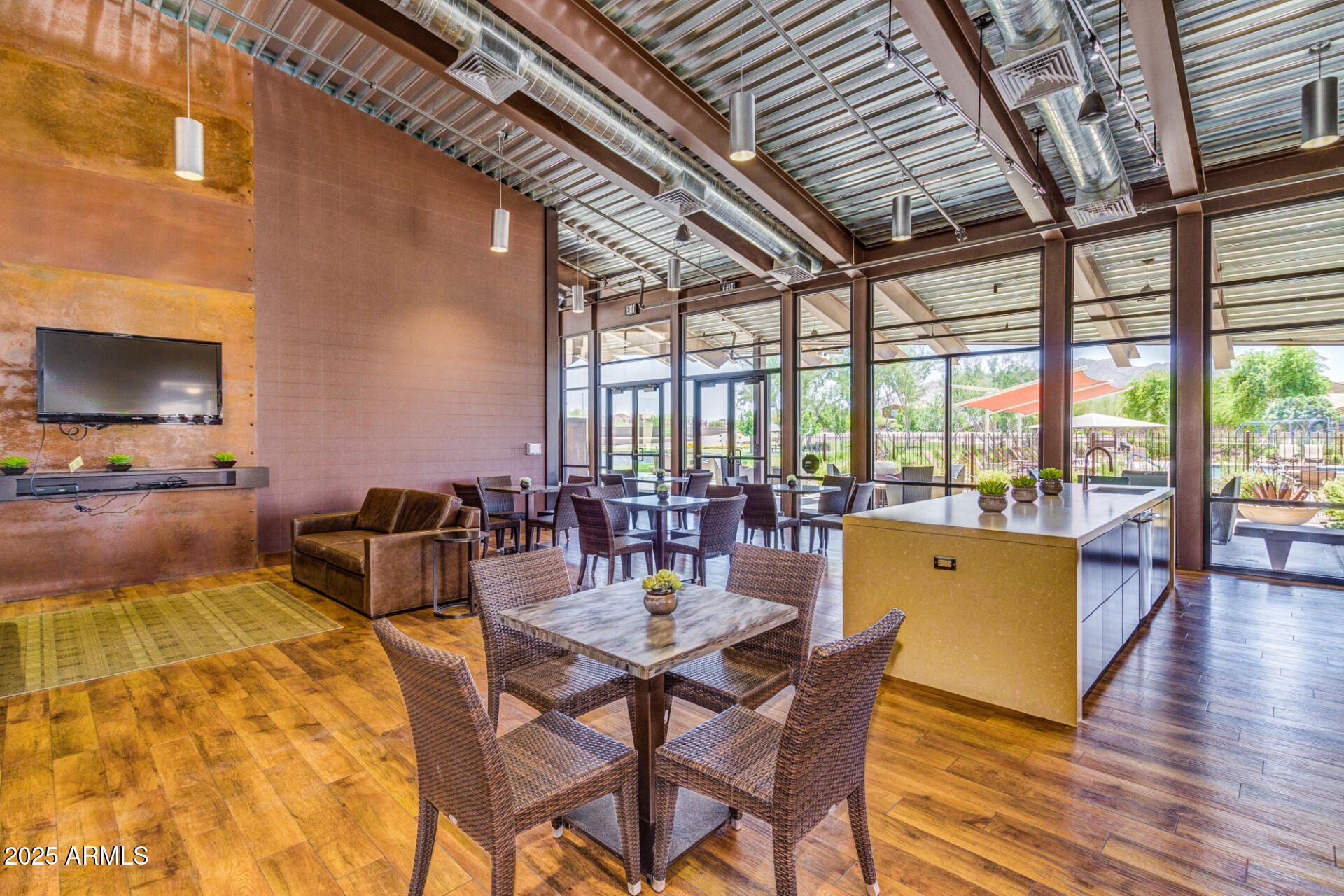 2169 East Gillcrest Road Gilbert, AZ 85298 - Photo 60 of 77 a view of a dining room with furniture window and wooden floor