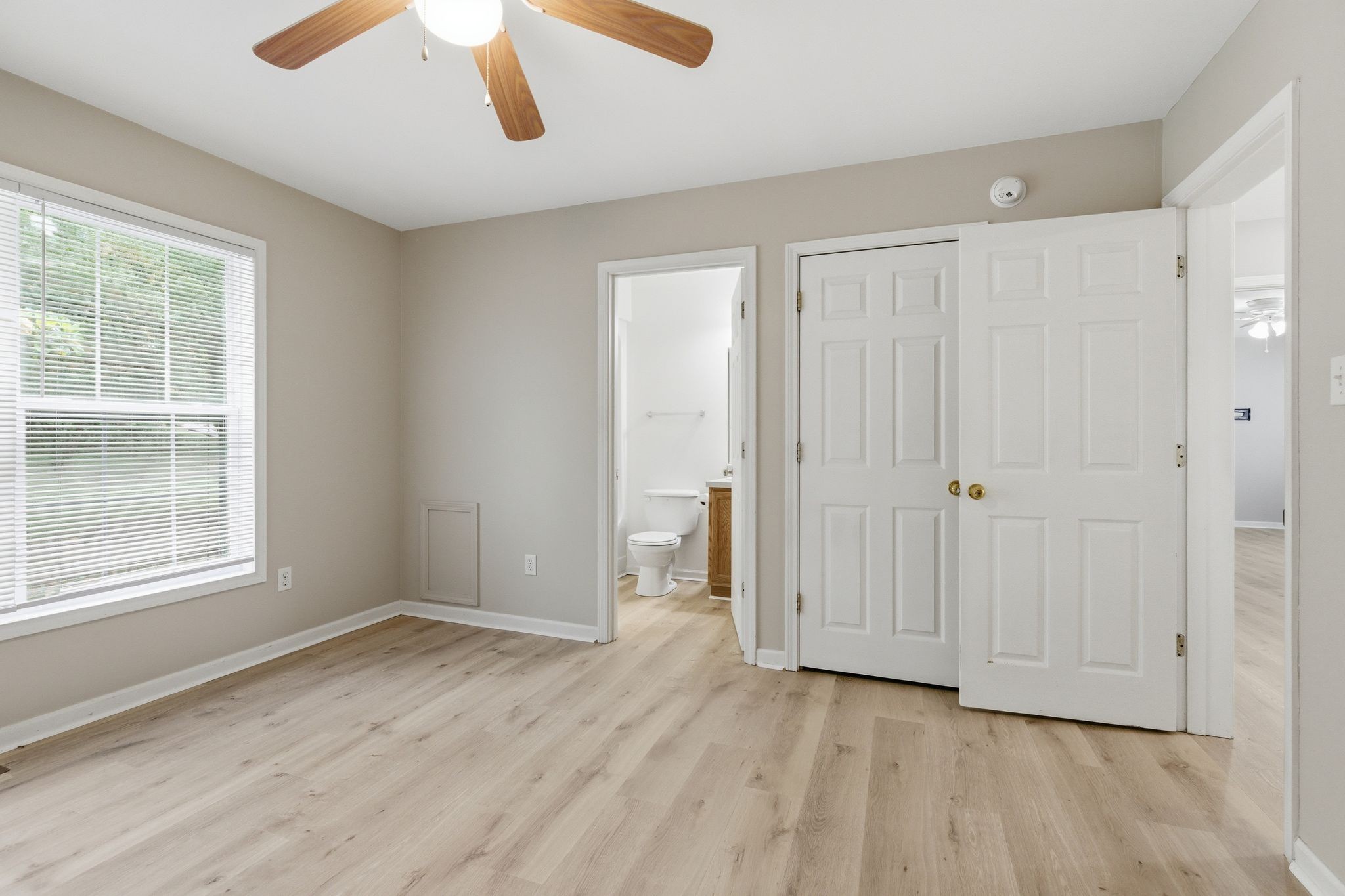 2642 Hibbitts Road Nashville, TN 37214 - Photo 17 of 29 an empty room with wooden floor cabinet and windows