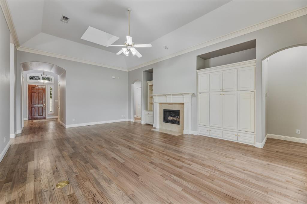 358 Pine Valley Fairview, TX 75069 - Photo 11 of 39 a view of livingroom with hardwood floor and ceiling fan