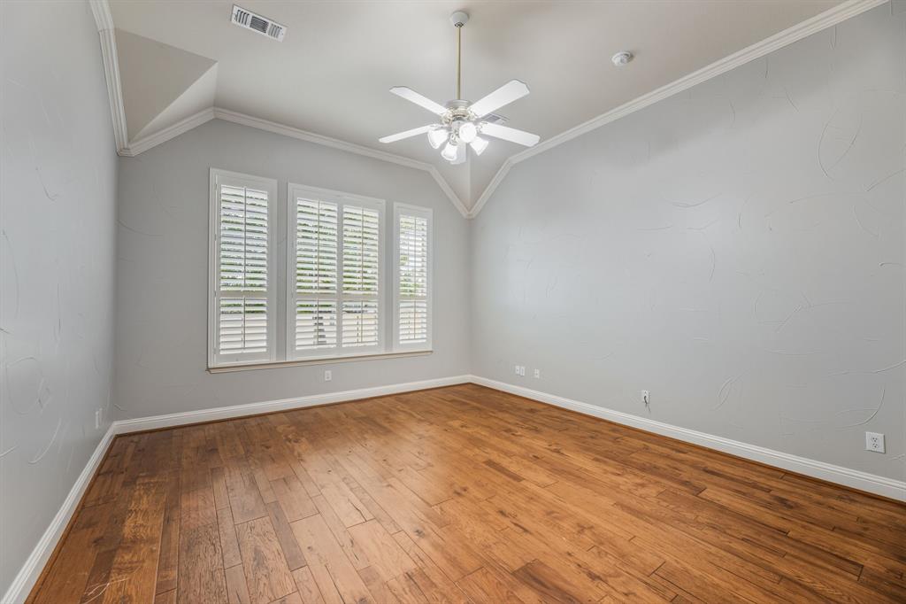 358 Pine Valley Fairview, TX 75069 - Photo 28 of 39 wooden floor in an empty room with a window