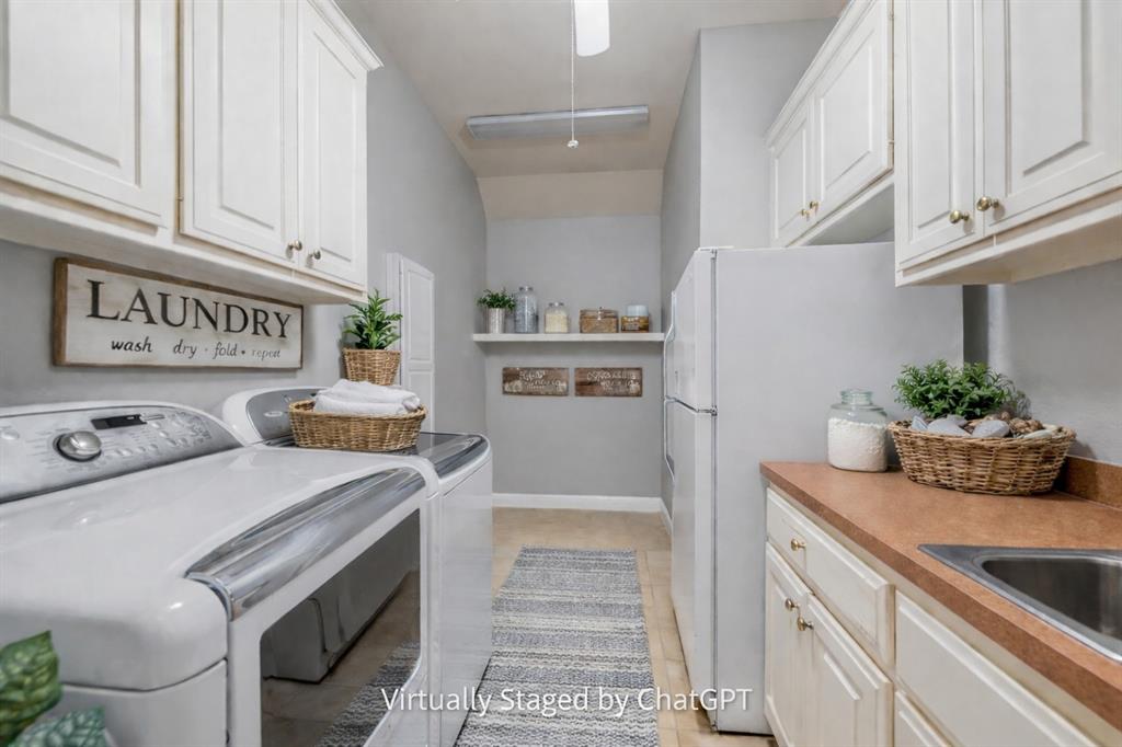 358 Pine Valley Fairview, TX 75069 - Photo 33 of 39 a kitchen with a sink and cabinets