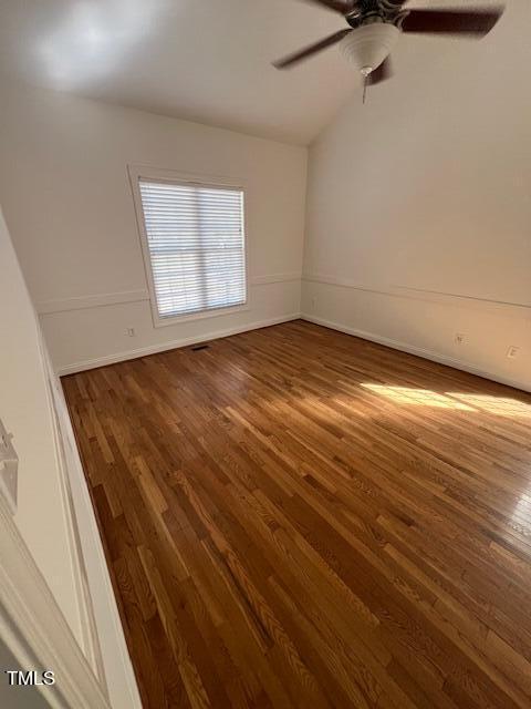 632 Compton Lane Rocky Mount, NC 27804 - Photo 21 of 35 an empty room with wooden floor cabinet and windows