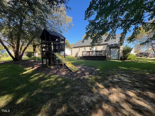 632 Compton Lane Rocky Mount, NC 27804 - Photo 32 of 35 a view of a yard with plants and a large tree