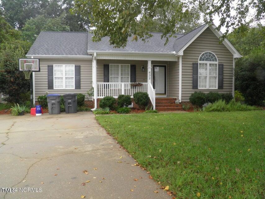 632 Compton Lane Rocky Mount, NC 27804 - Photo 35 of 35 a front view of a house with a yard and garage