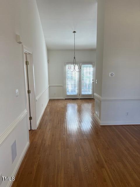 632 Compton Lane Rocky Mount, NC 27804 - Photo 7 of 35 a view of a room with wooden floor staircase and a kitchen view