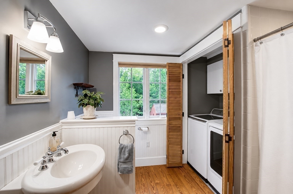 360 Teel Road Winchendon, MA 01475 - Photo 21 of 42 a bathroom with a sink a mirror and a window