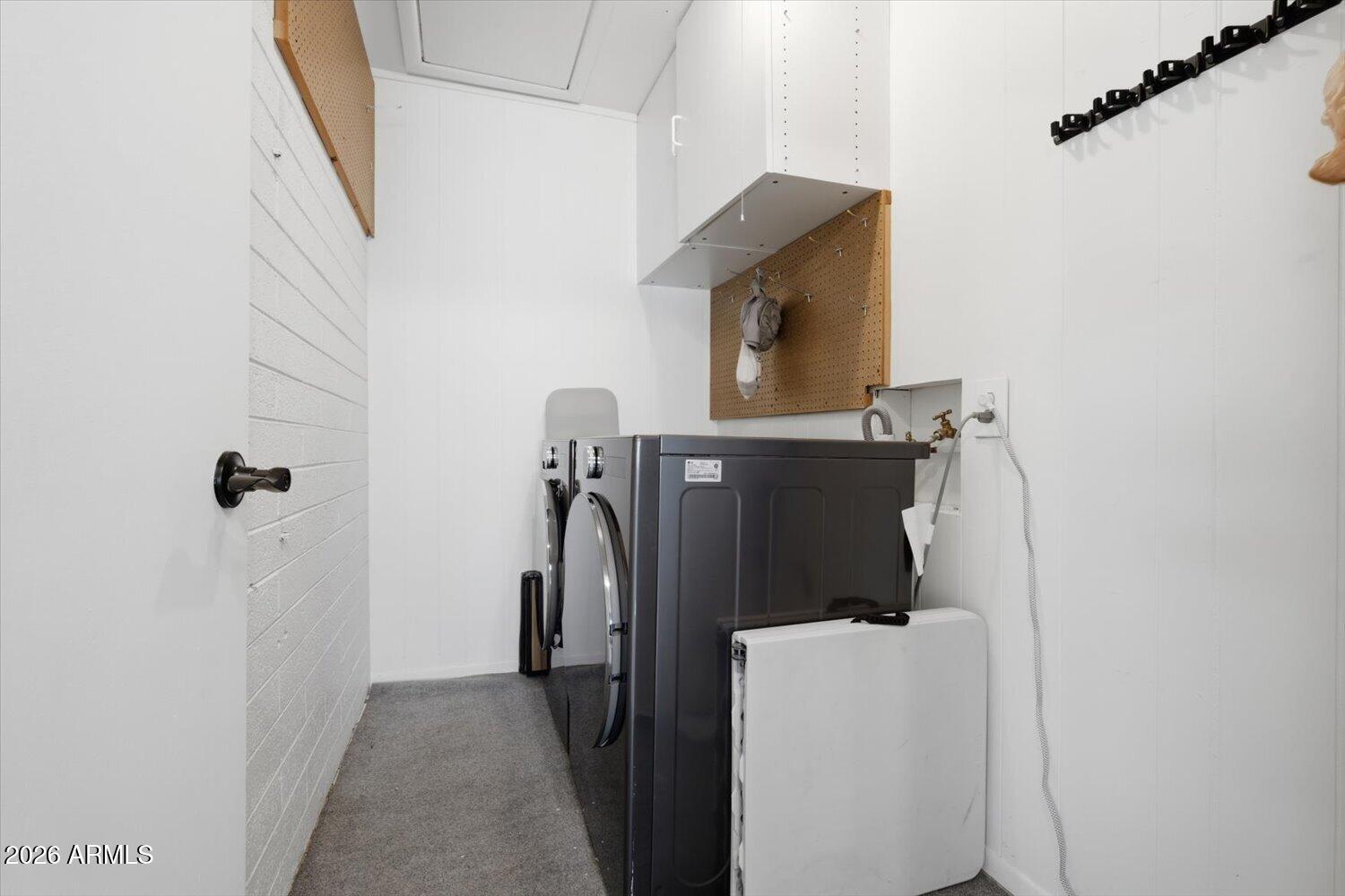 934 East Berridge Lane Phoenix, AZ 85014 - Photo 23 of 29 a utility room with dryer and washer