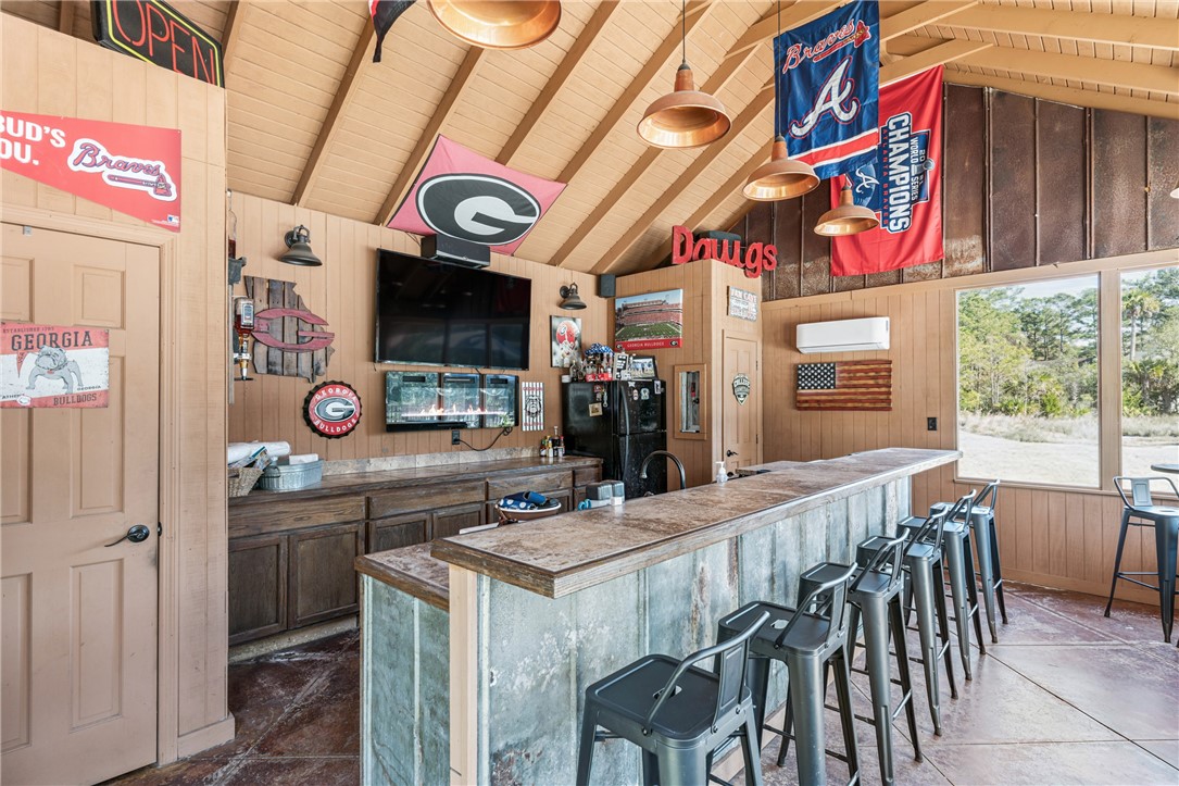 210 Sandpiper Road Brunswick, GA 31523 - Photo 37 of 54 Pool House with 1/2 bath - Perfect for Entertaining