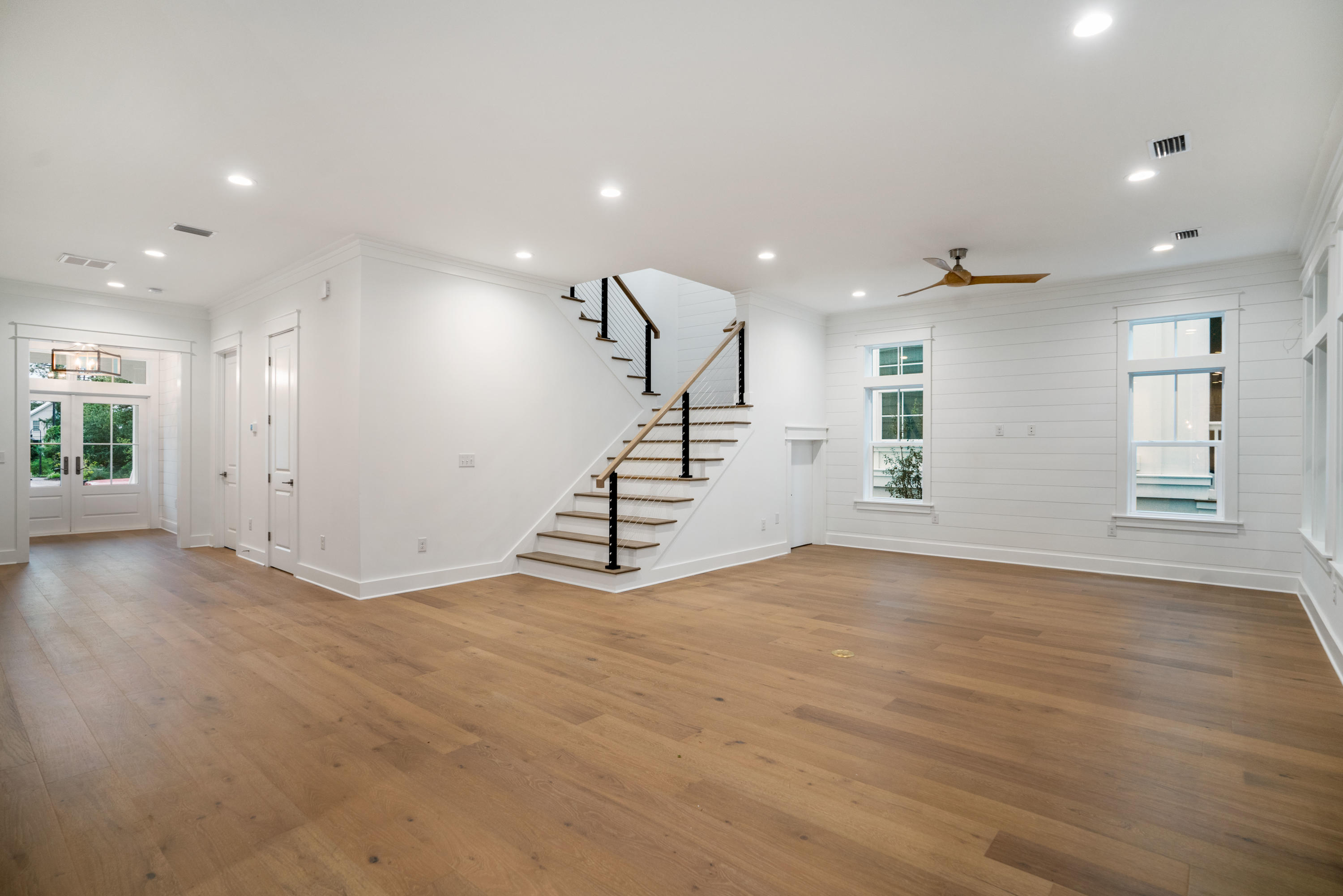 69 Matts Way Way Santa Rosa Beach, FL 32459 - Photo 11 of 37 a view of empty room with wooden floor and fan