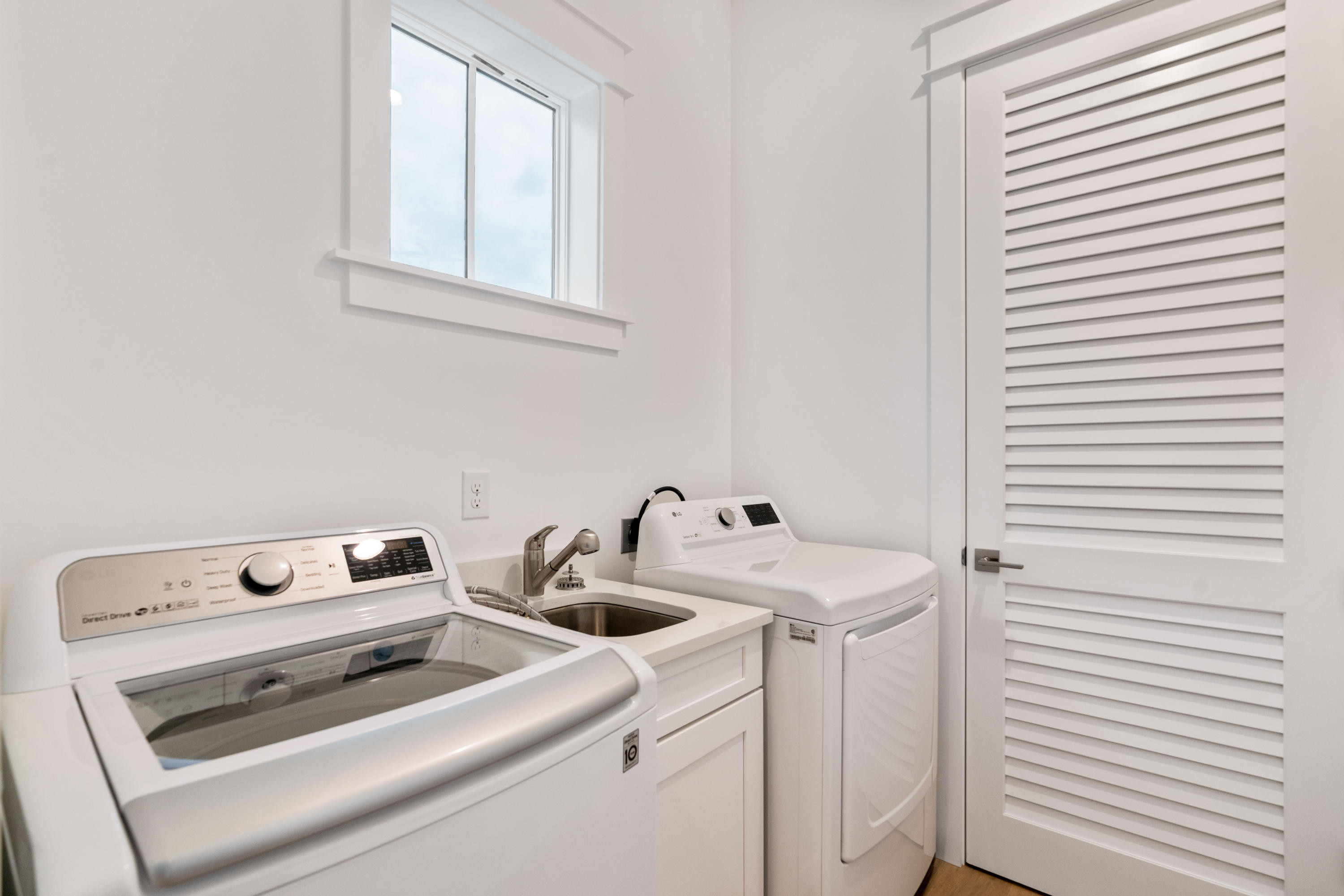 69 Matts Way Way Santa Rosa Beach, FL 32459 - Photo 23 of 37 a utility room with dryer and washer