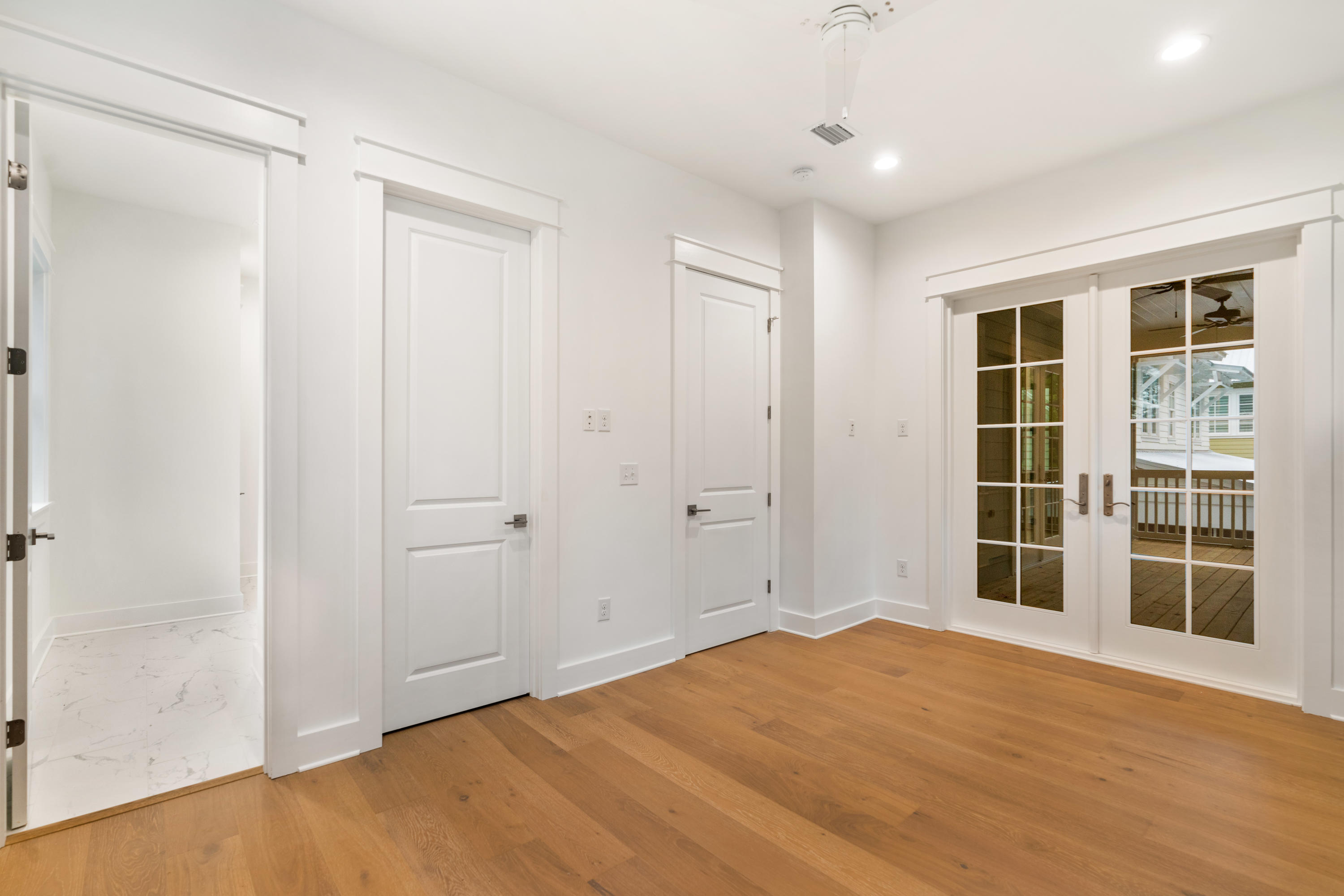 69 Matts Way Way Santa Rosa Beach, FL 32459 - Photo 25 of 37 a view of empty room with wooden floor and fan