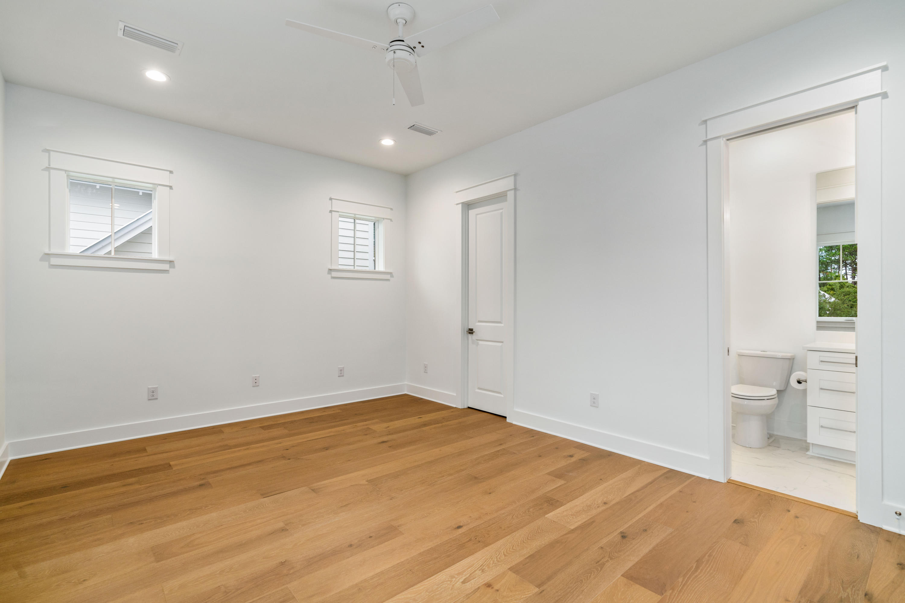 69 Matts Way Way Santa Rosa Beach, FL 32459 - Photo 27 of 37 wooden floor in an empty room with a window