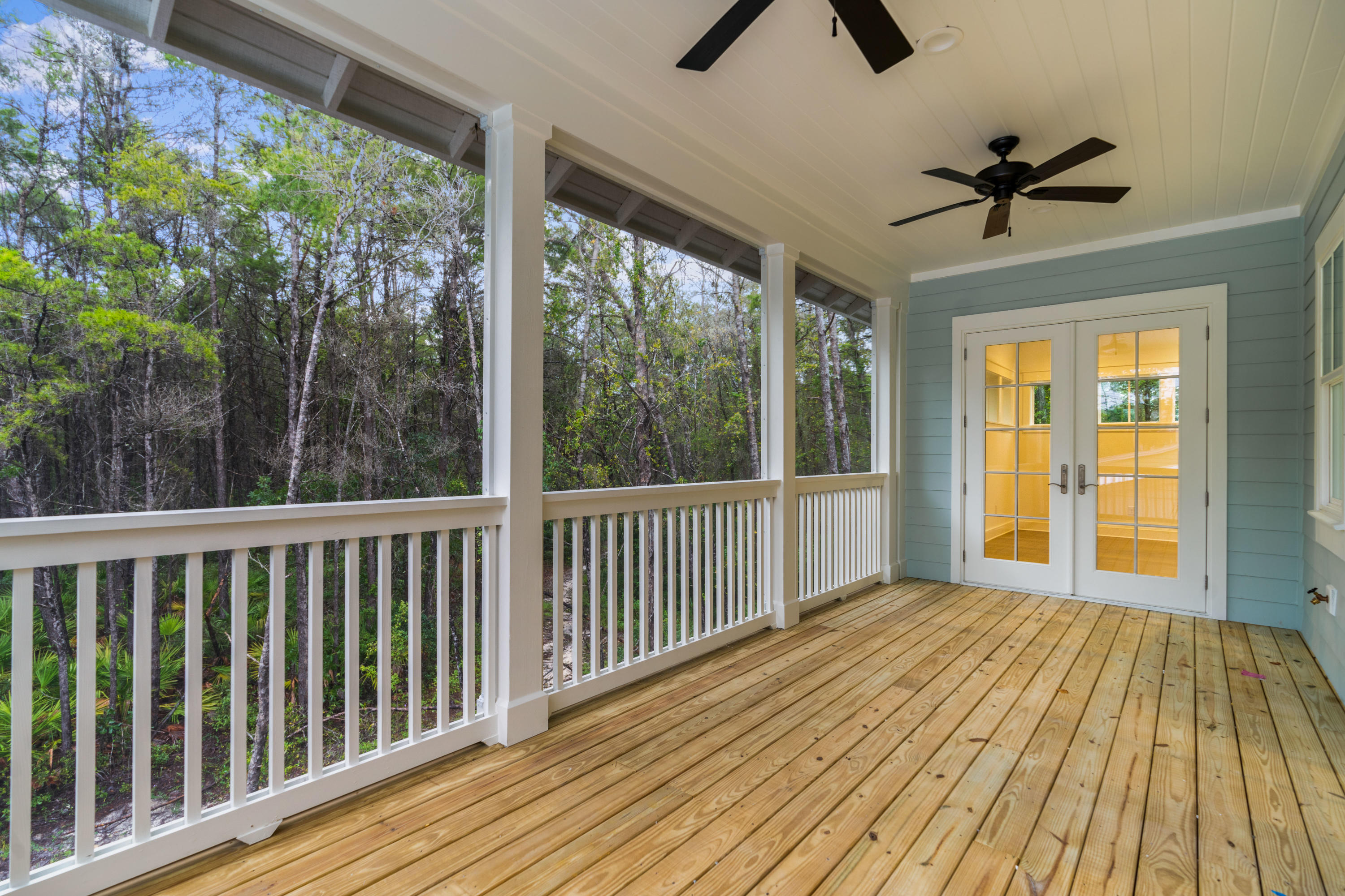 69 Matts Way Way Santa Rosa Beach, FL 32459 - Photo 31 of 37 a view of a porch with wooden floor and outdoor space