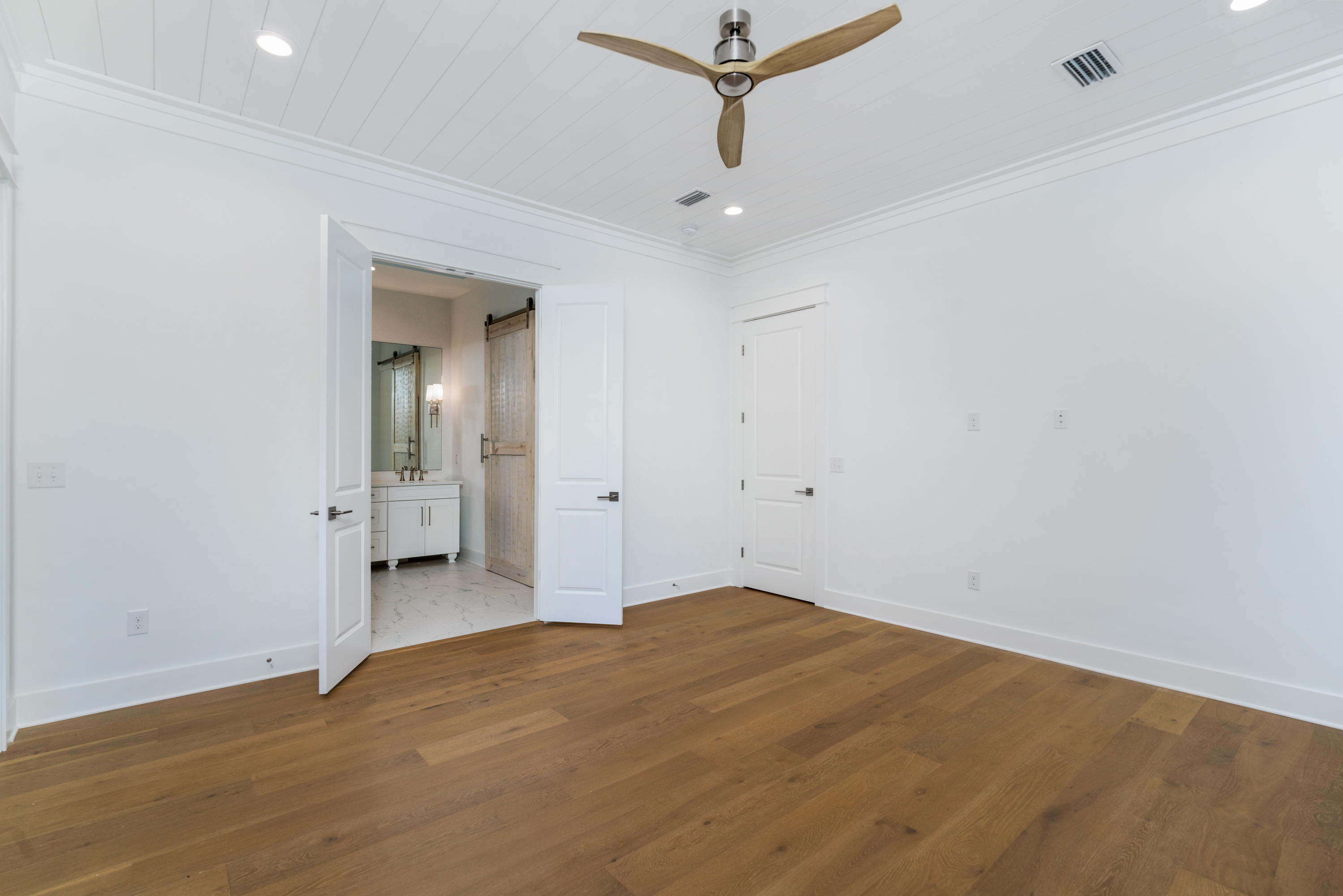 69 Matts Way Way Santa Rosa Beach, FL 32459 - Photo 33 of 37 wooden floor in an empty room
