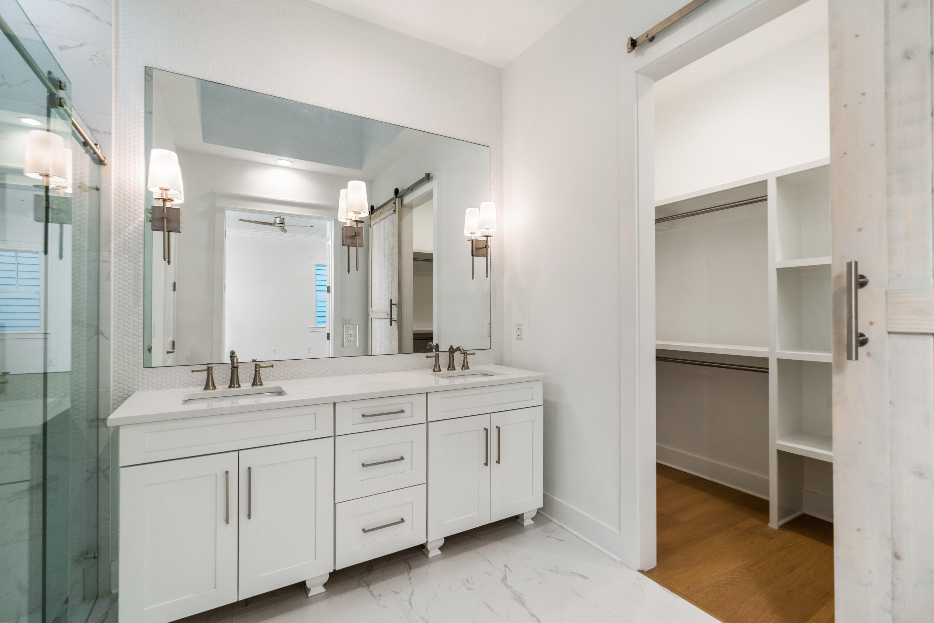 69 Matts Way Way Santa Rosa Beach, FL 32459 - Photo 37 of 37 a bathroom with a double vanity sink and mirror