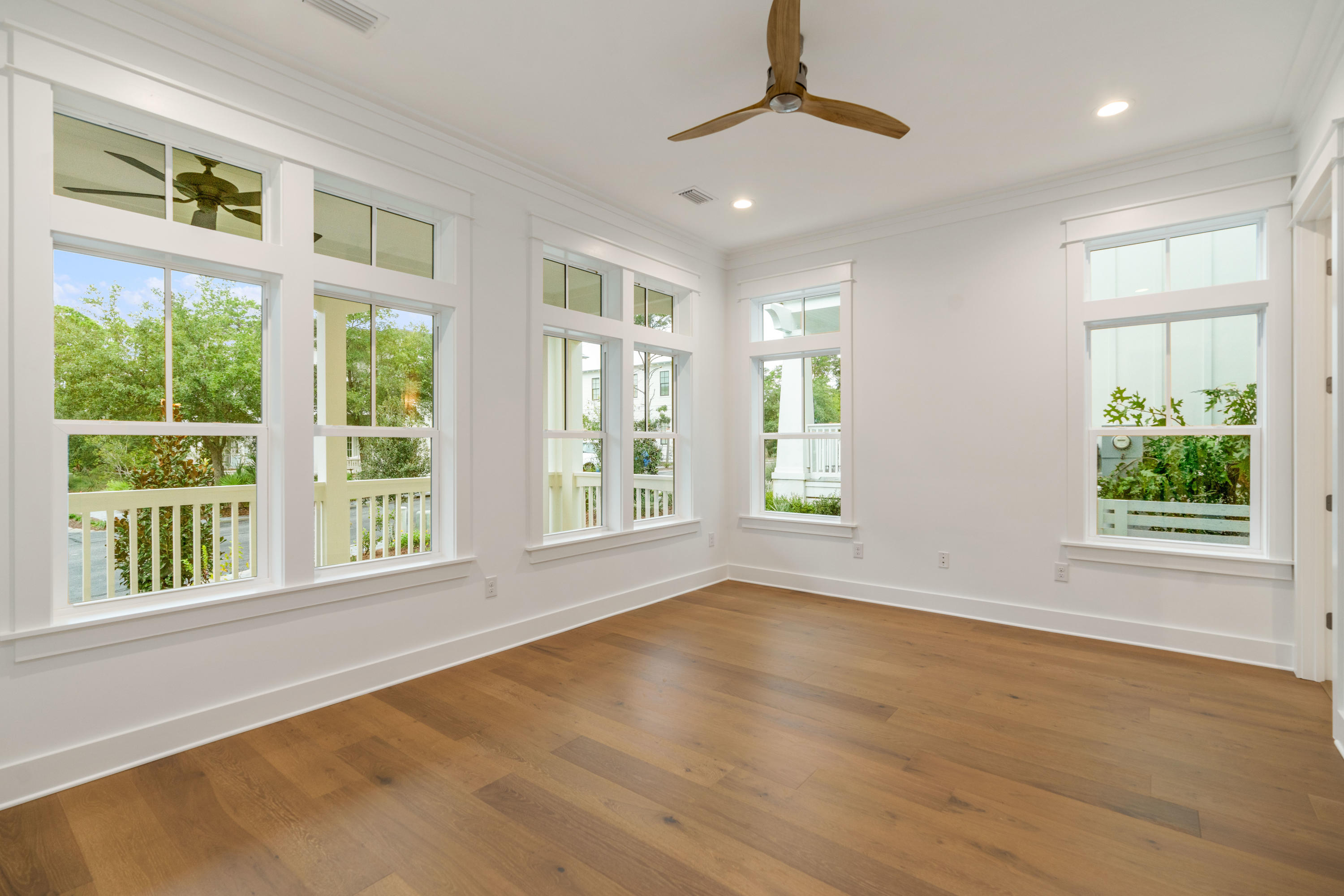 69 Matts Way Way Santa Rosa Beach, FL 32459 - Photo 6 of 37 a view of an empty room with a window and wooden floor