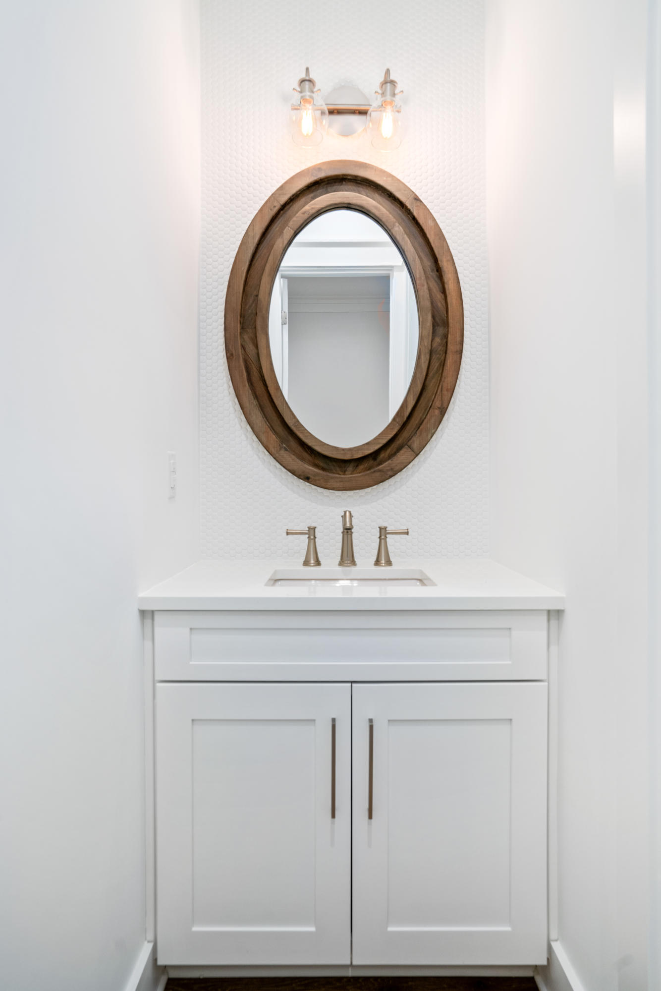 69 Matts Way Way Santa Rosa Beach, FL 32459 - Photo 10 of 37 a bathroom with a sink and a mirror