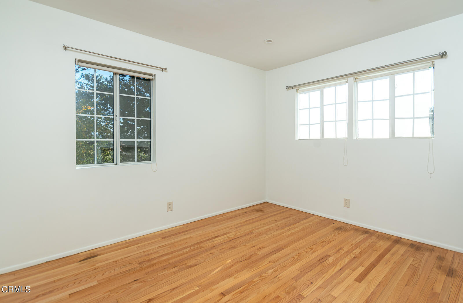 4516 Daleridge Road La Canada Flintridge, CA 91011 - Photo 13 of 22 a view of empty room with wooden floor and fan