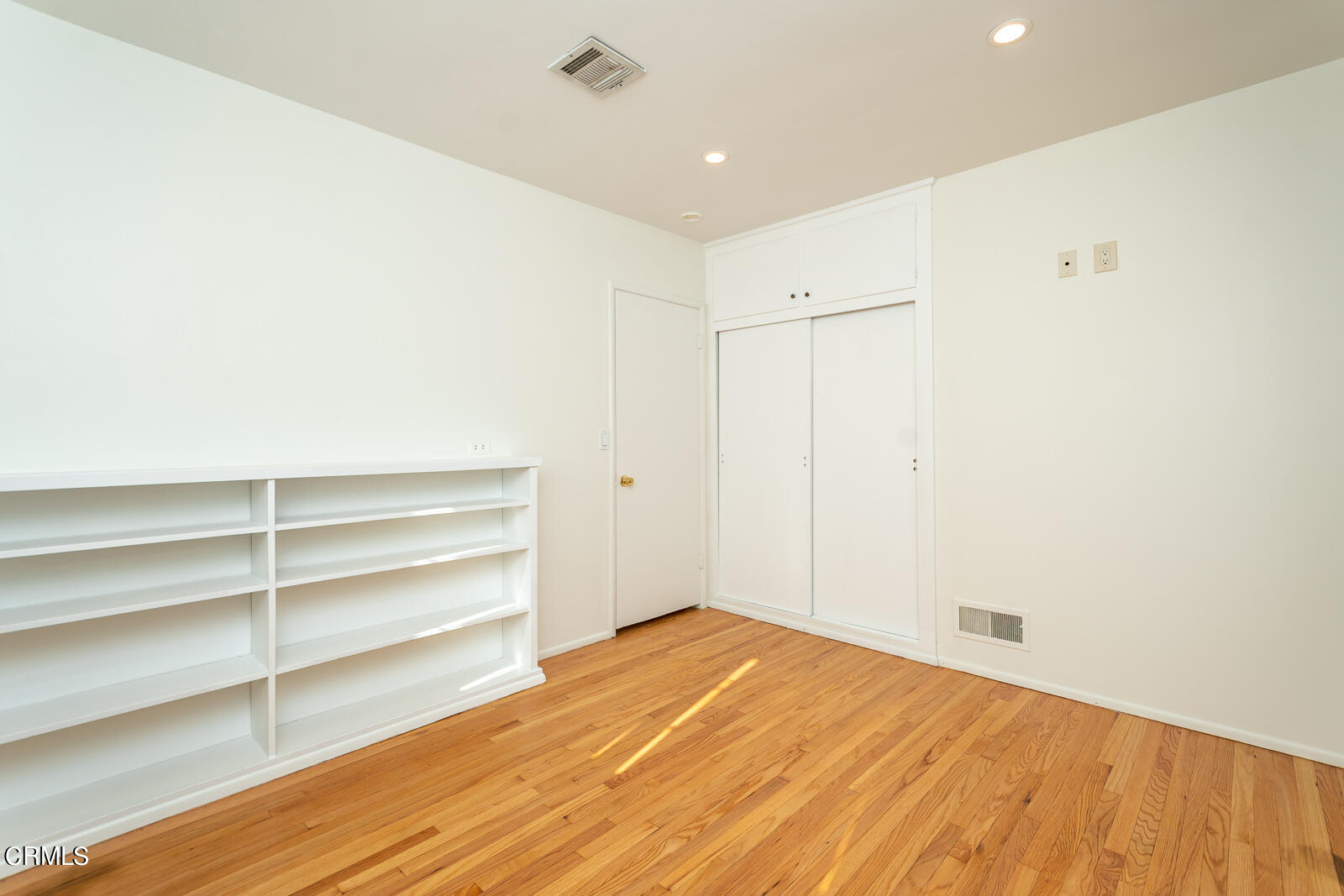 4516 Daleridge Road La Canada Flintridge, CA 91011 - Photo 14 of 22 a view of empty room with wooden floor and fan