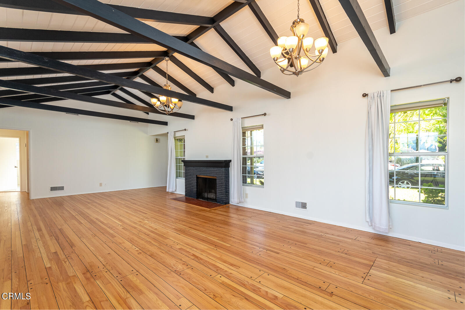 4516 Daleridge Road La Canada Flintridge, CA 91011 - Photo 3 of 22 a view of empty room with wooden floor and fan
