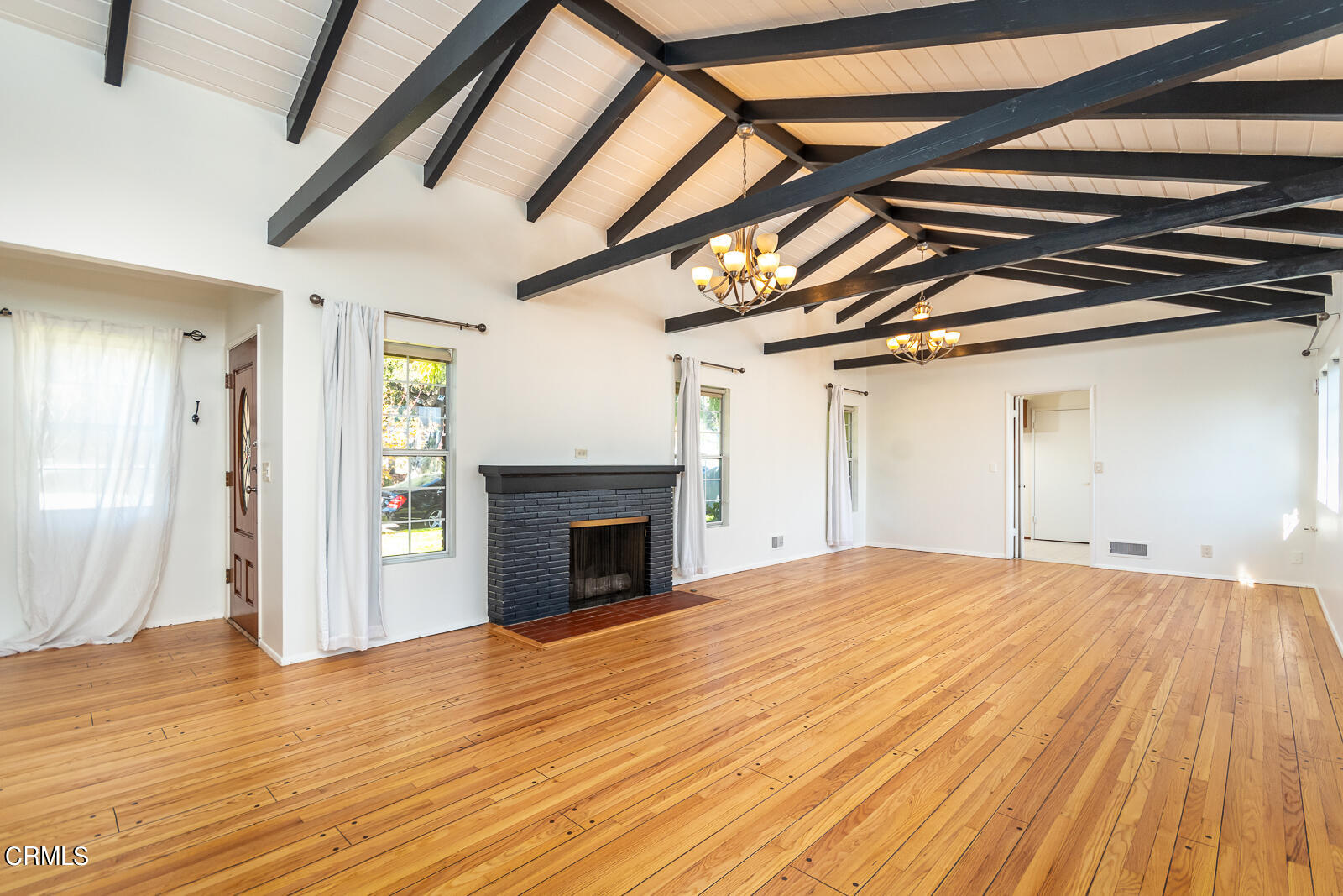 4516 Daleridge Road La Canada Flintridge, CA 91011 - Photo 4 of 22 a view of empty room with wooden floor and fireplace