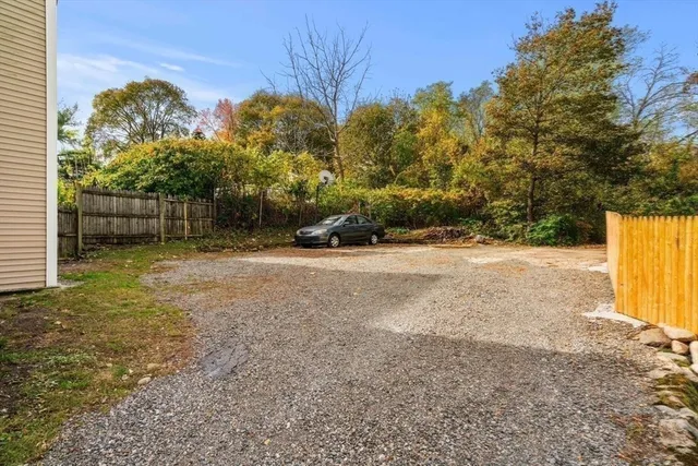 a view of a garden with a bench