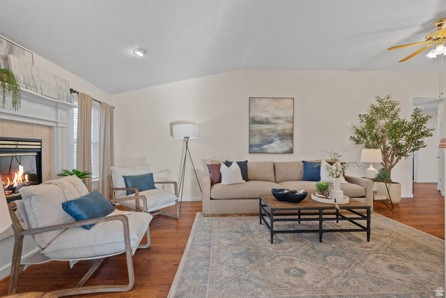 555 East 1700 N Street Mapleton, UT 84664 - Photo 17 of 49 Spacious living area featuring wood-finish flooring, a fireplace with a white mantel, and recessed ceiling lighting