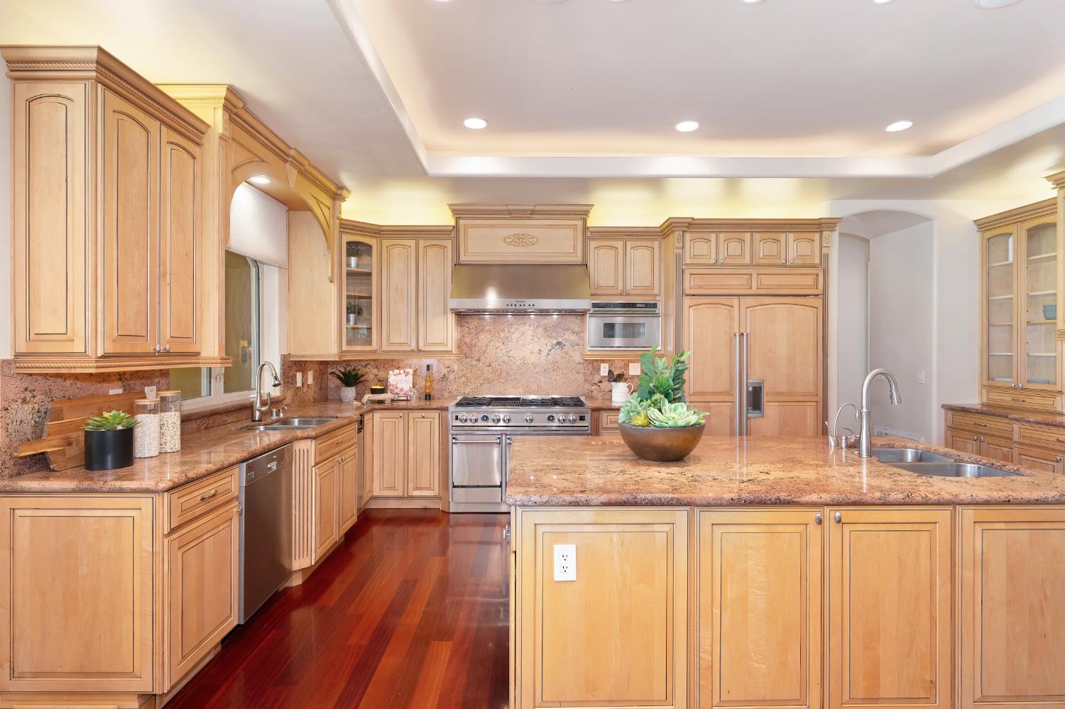 5037 Milton Ranch Road Shingle Springs, CA 95682 - Photo 27 of 99 a kitchen with stainless steel appliances granite countertop a stove a sink and a refrigerator
