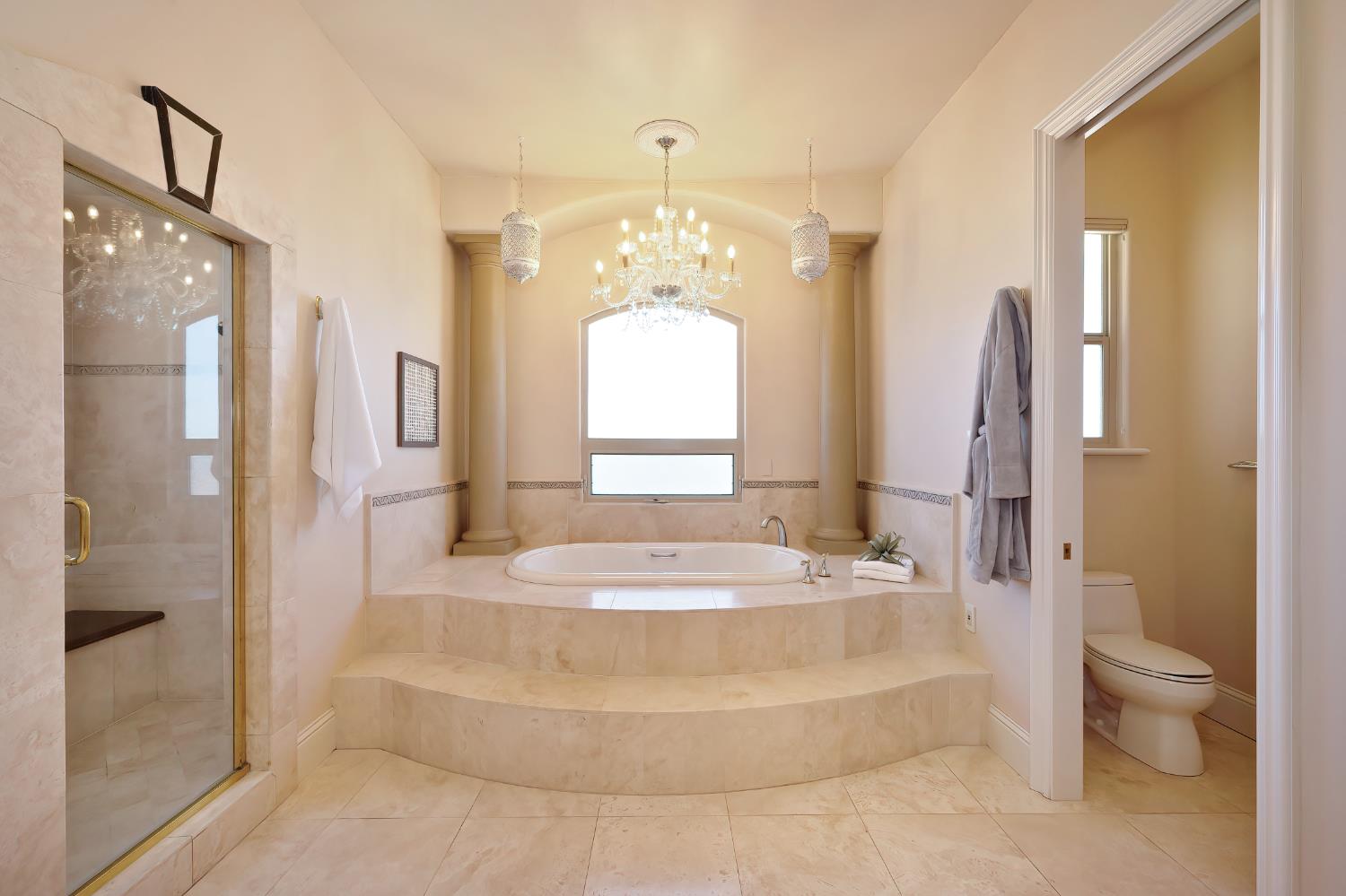 5037 Milton Ranch Road Shingle Springs, CA 95682 - Photo 41 of 99 a spacious bathroom with a double vanity sink toilet mirror and bathtub