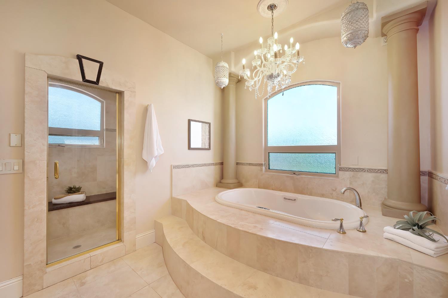 5037 Milton Ranch Road Shingle Springs, CA 95682 - Photo 42 of 99 a spacious bathroom with a granite countertop tub shower and mirror