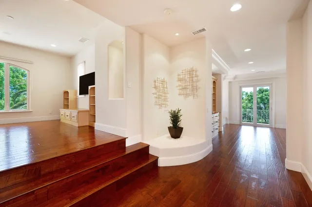 a view of a swimming pool with a patio