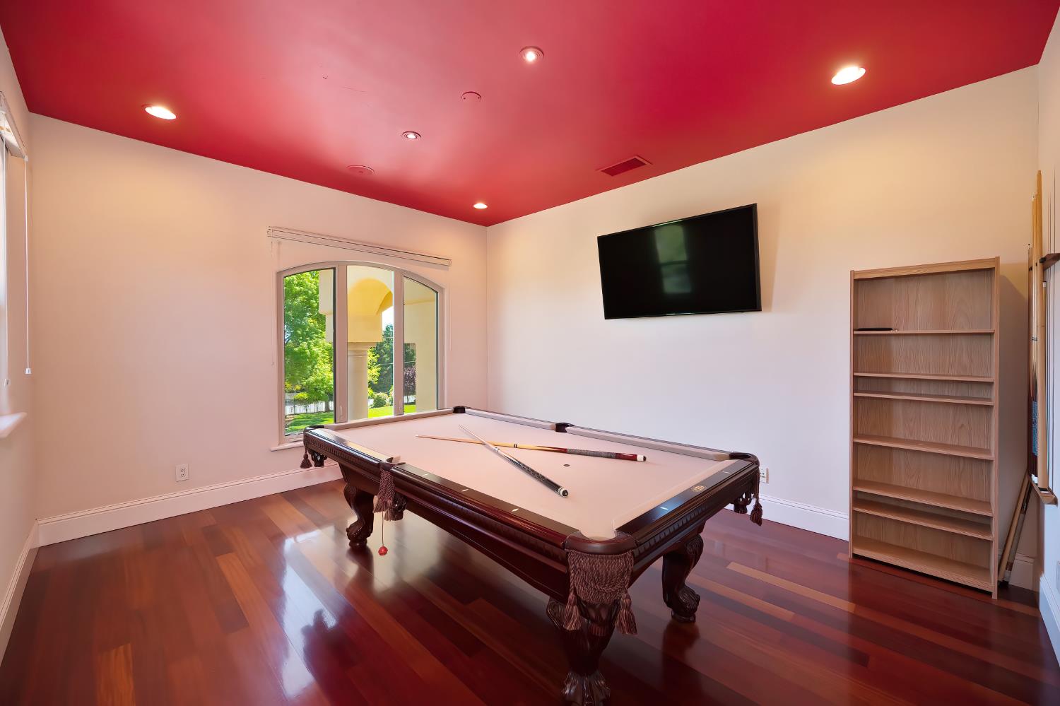 5037 Milton Ranch Road Shingle Springs, CA 95682 - Photo 50 of 99 a room with furniture and a flat screen tv