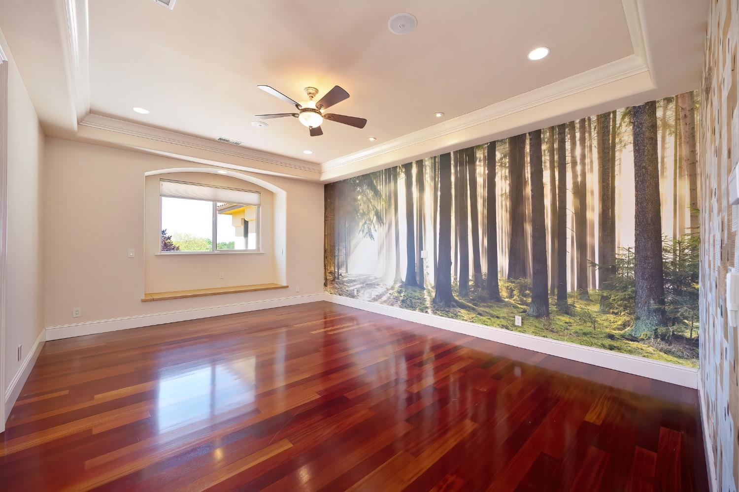 5037 Milton Ranch Road Shingle Springs, CA 95682 - Photo 54 of 99 a view of an empty room with wooden floor and a window