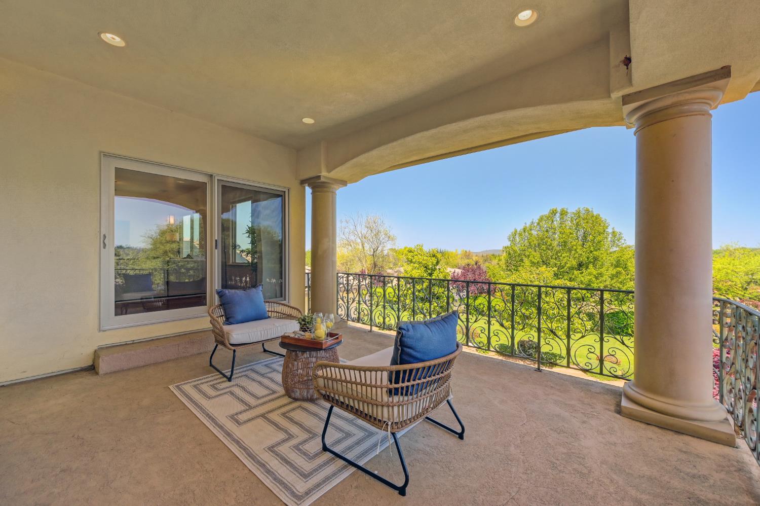 5037 Milton Ranch Road Shingle Springs, CA 95682 - Photo 60 of 99 a living room with furniture and a floor to ceiling window