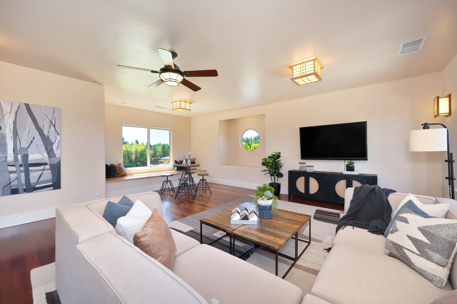 5037 Milton Ranch Road Shingle Springs, CA 95682 - Photo 63 of 99 a living room with furniture a flat screen tv and a large window