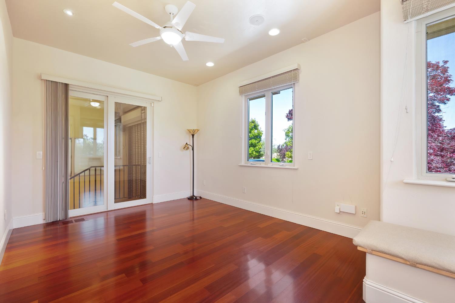 5037 Milton Ranch Road Shingle Springs, CA 95682 - Photo 80 of 99 a view of an empty room with window and wooden floor