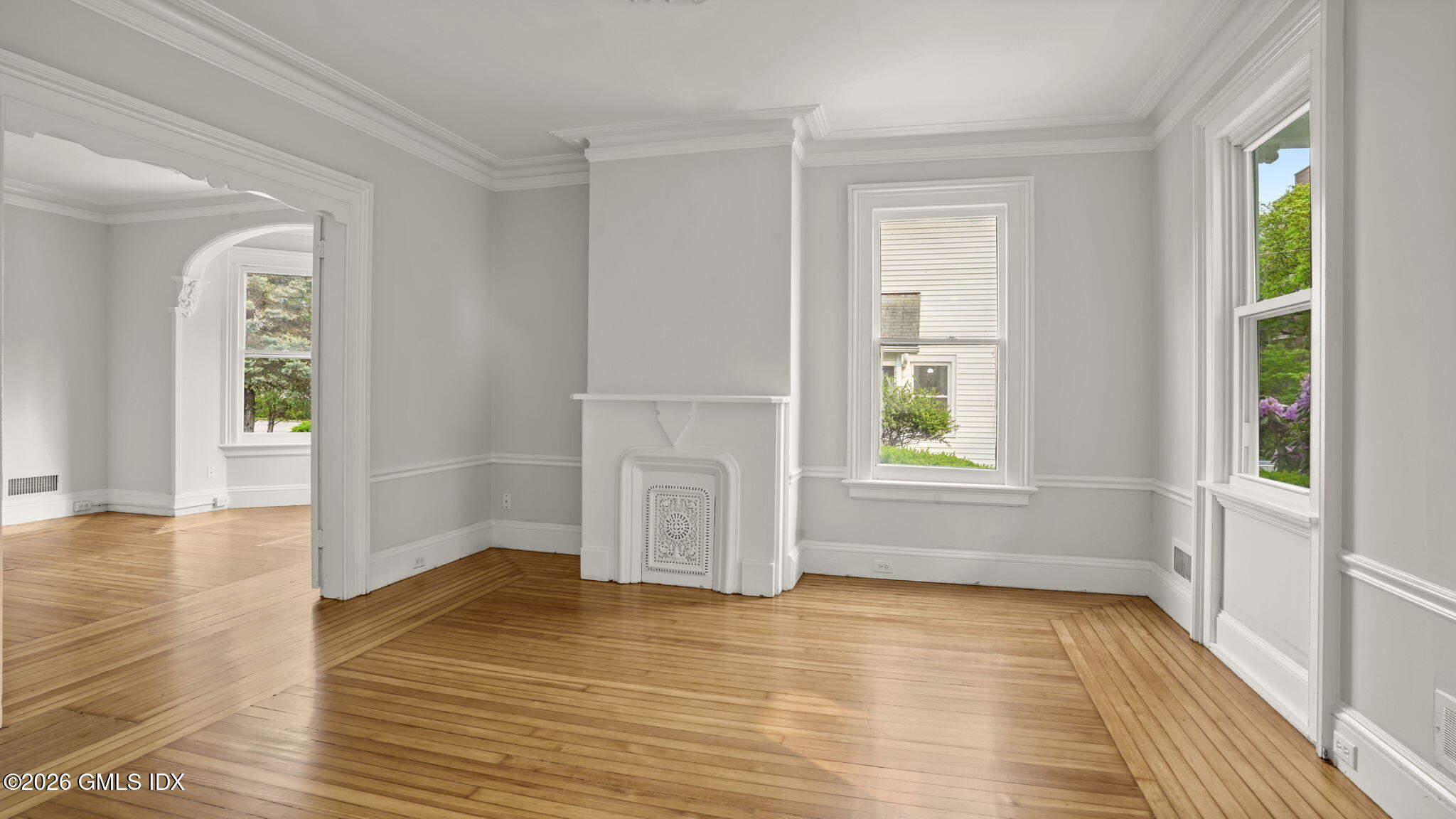 43 Church Street, Unit 1 Greenwich, CT 06830 - Photo 4 of 17 a view of empty room with wooden floor and fan