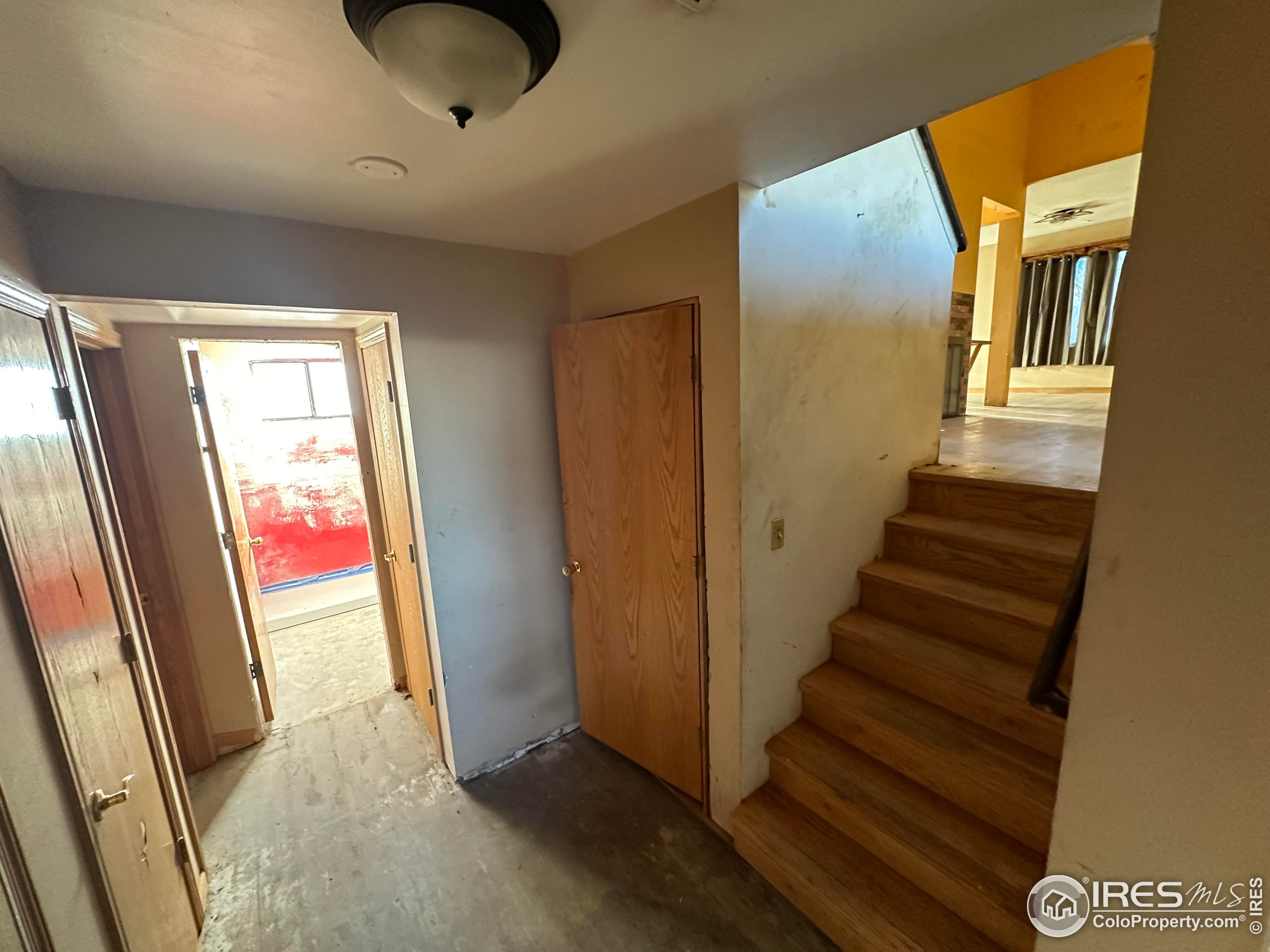 832 21st Street Southwest Loveland, CO 80537 - Photo 15 of 15 a view of entryway with wooden floor