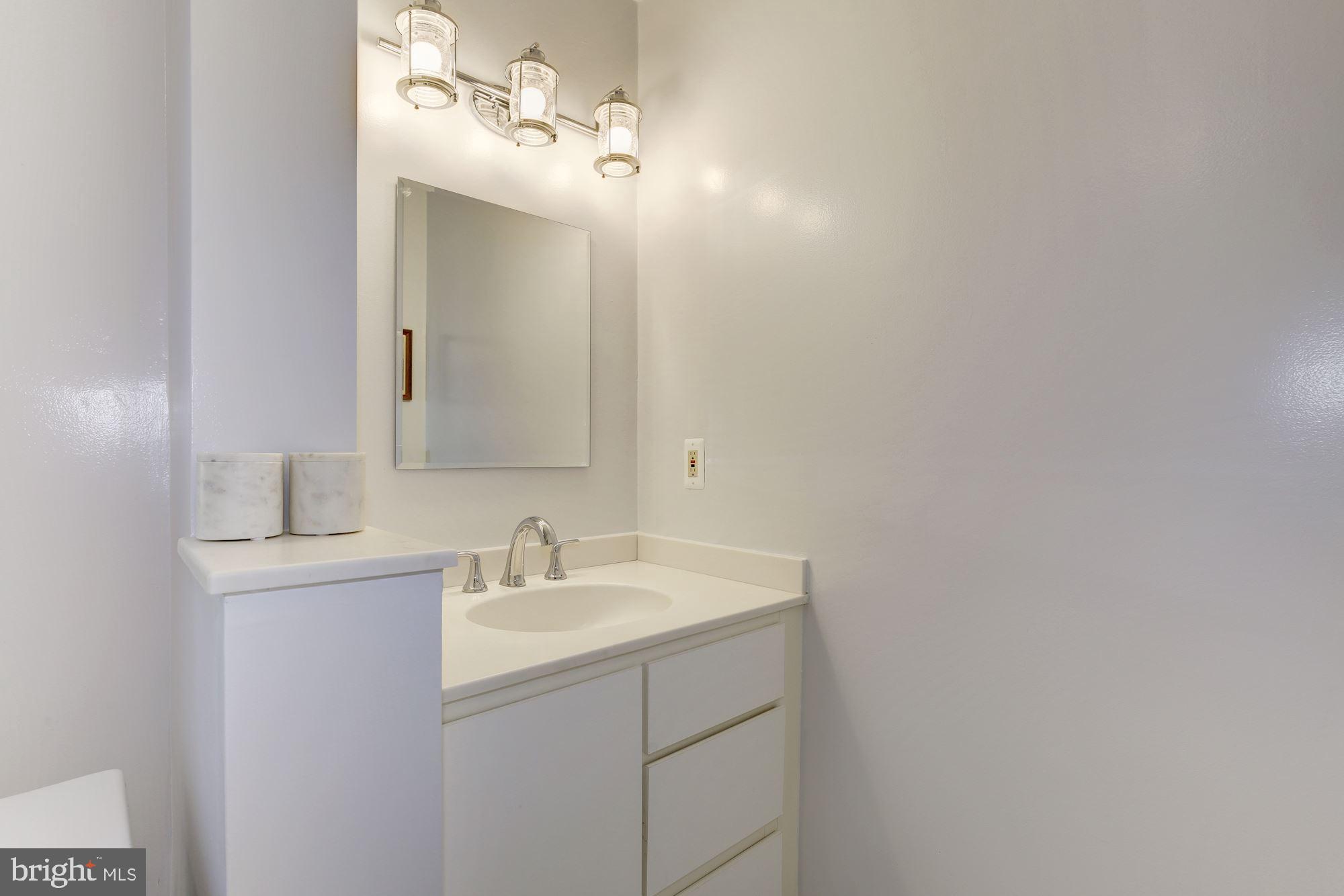 4013 Saul Road Kensington, MD 20895 - Photo 22 of 33 Hall bath with new lighting and fixtures