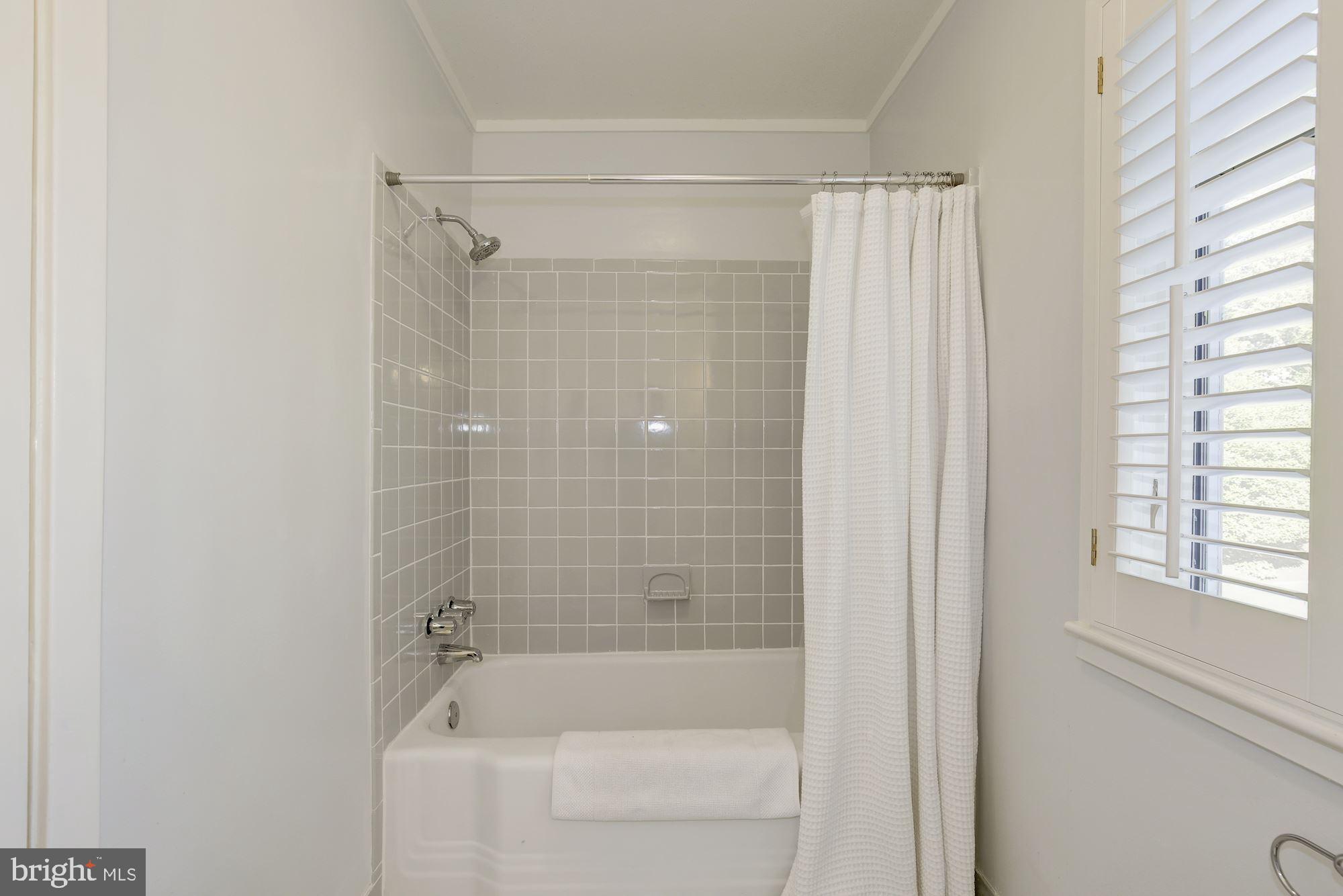 4013 Saul Road Kensington, MD 20895 - Photo 23 of 33 Hall bath, view 2 with tub/shower