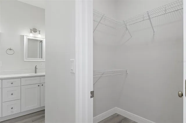 a bathroom with a sink a toilet and a tub