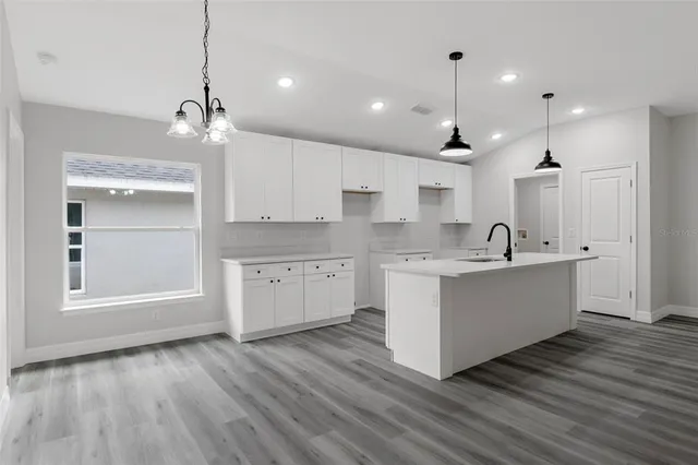 a view of a front door and a window