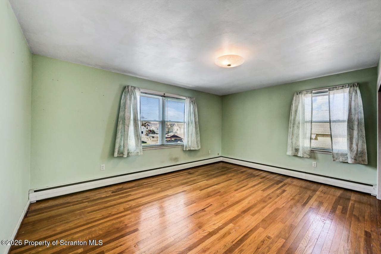 703 Ohara Street Scranton, PA 18505 - Photo 16 of 36 an empty room with windows