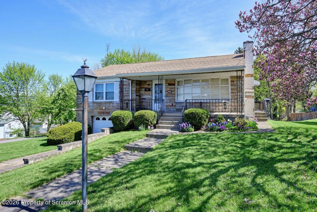 703 Ohara Street Scranton, PA 18505 - Photo 2 of 36 a view of a house with garden and plants
