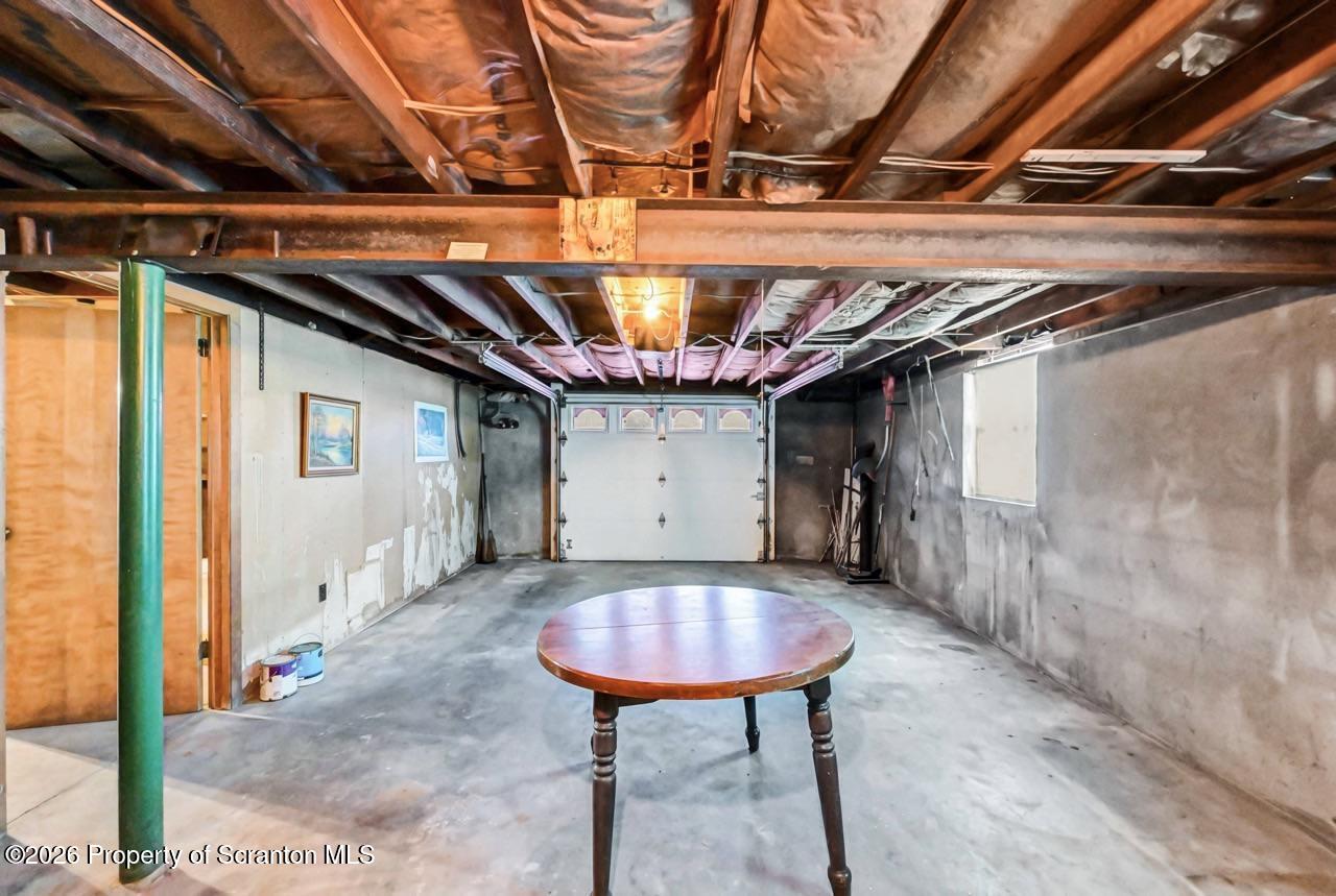 703 Ohara Street Scranton, PA 18505 - Photo 31 of 36 a view of a room with a table and chairs