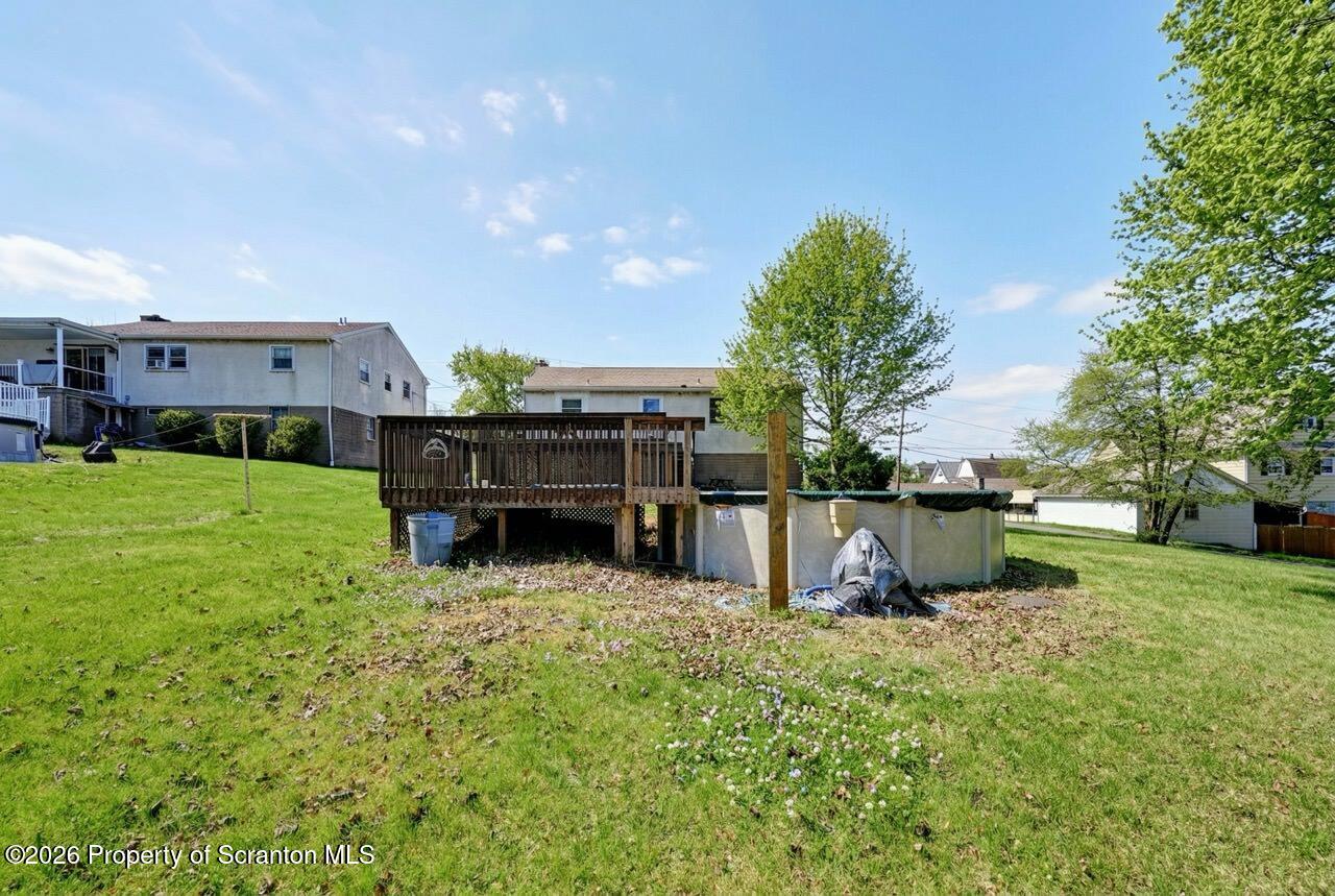 703 Ohara Street Scranton, PA 18505 - Photo 34 of 36 a view of a backyard with sitting area