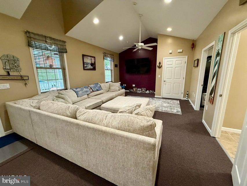 911 Lower Main Street Saxton, PA 16678 - Photo 12 of 63 a living room with furniture and a flat screen tv