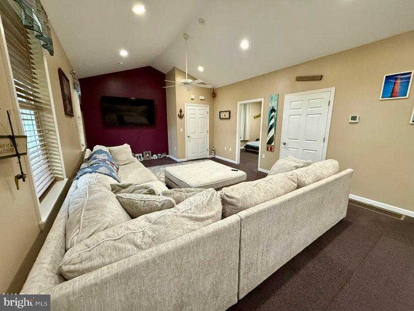 911 Lower Main Street Saxton, PA 16678 - Photo 13 of 63 a living room with furniture and a flat screen tv